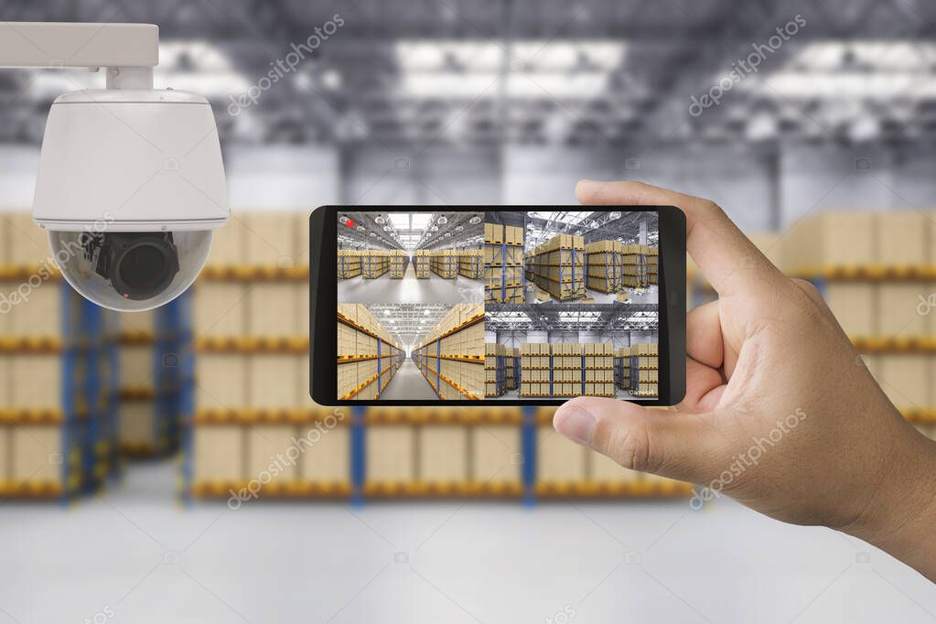 Warehouse interior with dome cameras covering aisles