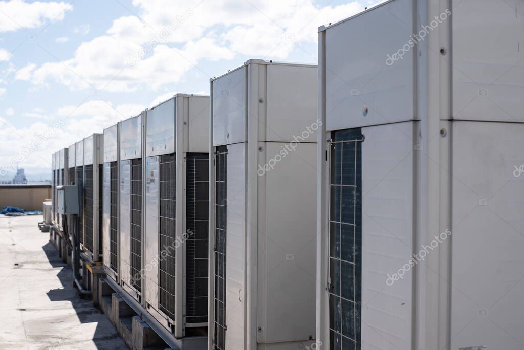 VRF outdoor condenser units on a rooftop.